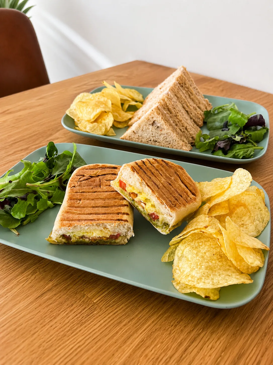 Panini and sandwich platter with salad and crisps at Blend Coffee Shop